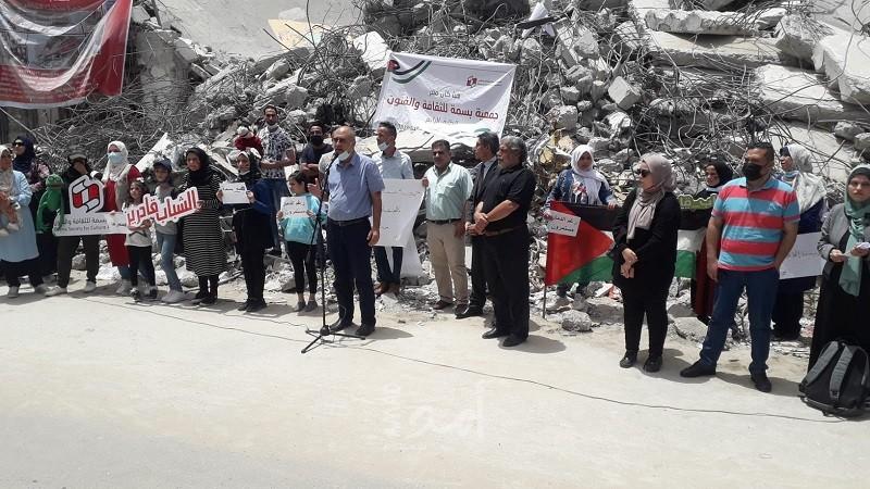 بسمة للثقافة والفنون تنظم وقفة تضامنية على أنقاض مقراتها ببرج الشروق بغزة