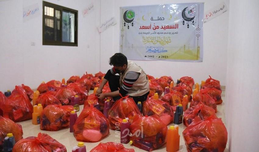 مركز شباب الأمة يقدم طرود غذائية للأسر المتضررة في غزة