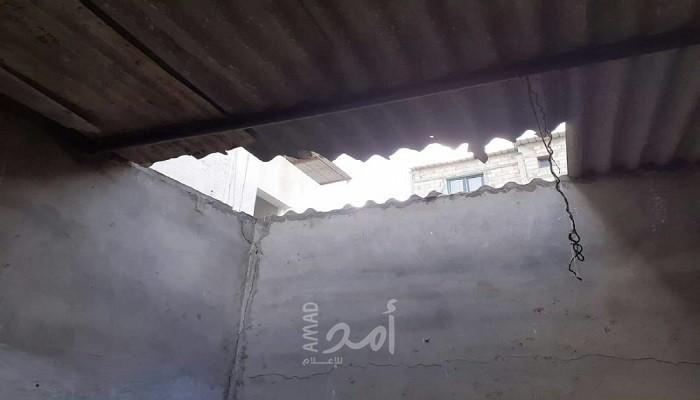 مصرع مواطنة إثر انهيار منزل قديم في خانيونس - صور