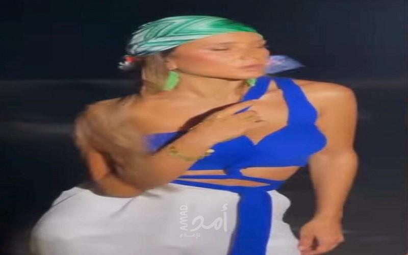 نيللى كريم فى جلسة تصوير على أنغام "كل الناس ناشفة إلا أنت بلسم"