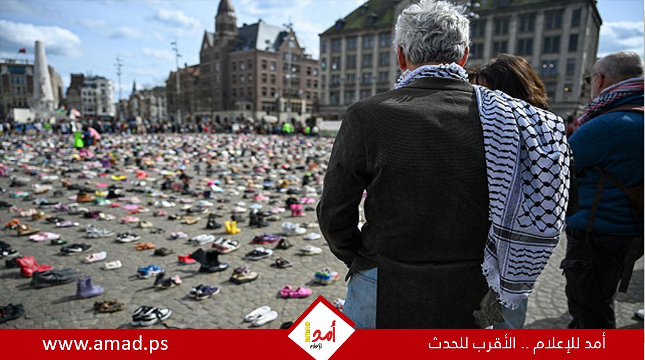 أحذية أطفال وأسماء صحافيين تملأ "دام".. صرخة من هولندا لأجل غزة - صور
